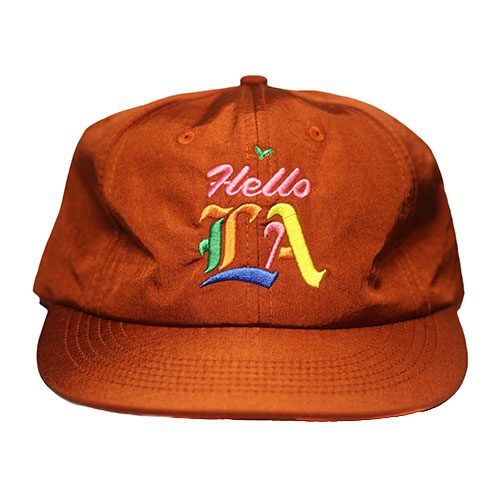 orange colored had with Hello LA logo