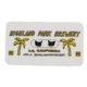 Pair of black enamel cat stud earrings displayed on a Highland Park Brewery card with yellow palm tree illustrations and text reading 'Highland Park Brewery, LA, California'.