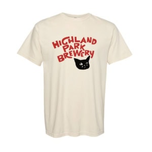 Cream-colored Comfort Colors t-shirt featuring the Highland Park Brewery logo in bold red lettering with an original Sad Cat illustration by Scrap Labs.