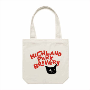 The Sad Cat Tote Bag is a white tote featuring "Highland Park Brewery" in red text above a black cat’s face graphic.