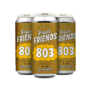 A 4-pack of Fresh Friends: 803 beer, featuring a gold and yellow design with "Newest in Hop Innovation" and decorative stars and sparkles on the cans. A 4-pack of Fresh Friends: 803 beer, featuring a gold and yellow design with "Newest in Hop Innovation" and decorative stars and sparkles on the cans.