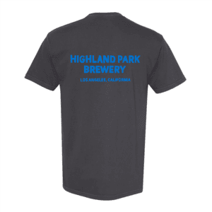 The Beers Tee is a dark gray T-shirt with blue text on the back that says "HIGHLAND PARK BREWERY" and "LOS ANGELES, CALIFORNIA" underneath.