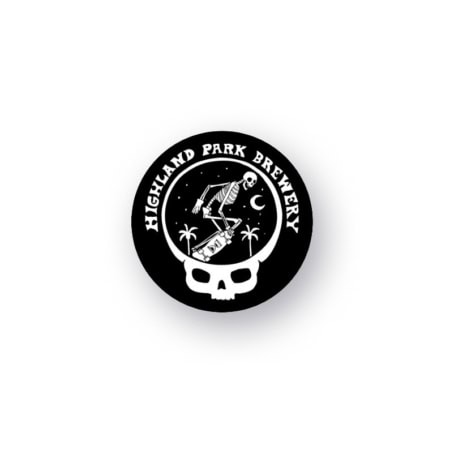 A round black logo for the "Timbo Week Pin 2026" features "Highland Park Brewery" in white text. A skeleton skateboards under a crescent moon, surrounded by stars and palm trees, with a white skull outline forming the lower border.