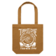 The TimboZone Tote Bag features a brown base with a white graphic of a skull, hands, swirling patterns, and the words "Timbo Zone," "Highland Park Brewery," and "Timbo Week 2026.