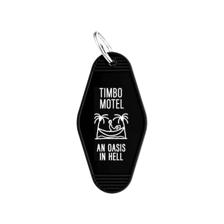Timbo Week 2026 Keychain: Black motel-style keychain with white "TIMBO MOTEL AN OASIS IN HELL" text and a skeleton relaxing in a hammock between two palm trees.