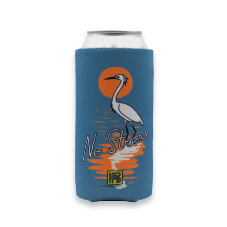 Blue No Stress Koozie foam sleeve featuring a graphic of a white heron standing in water before a large orange sun, with the text “No Stress” and a small yellow logo at the bottom.