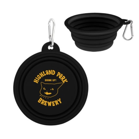 Black Collapsible Travel Dog Bowl with a metal carabiner, featuring a yellow cat graphic and the text “Highland Park Brewery Drink Up!”.